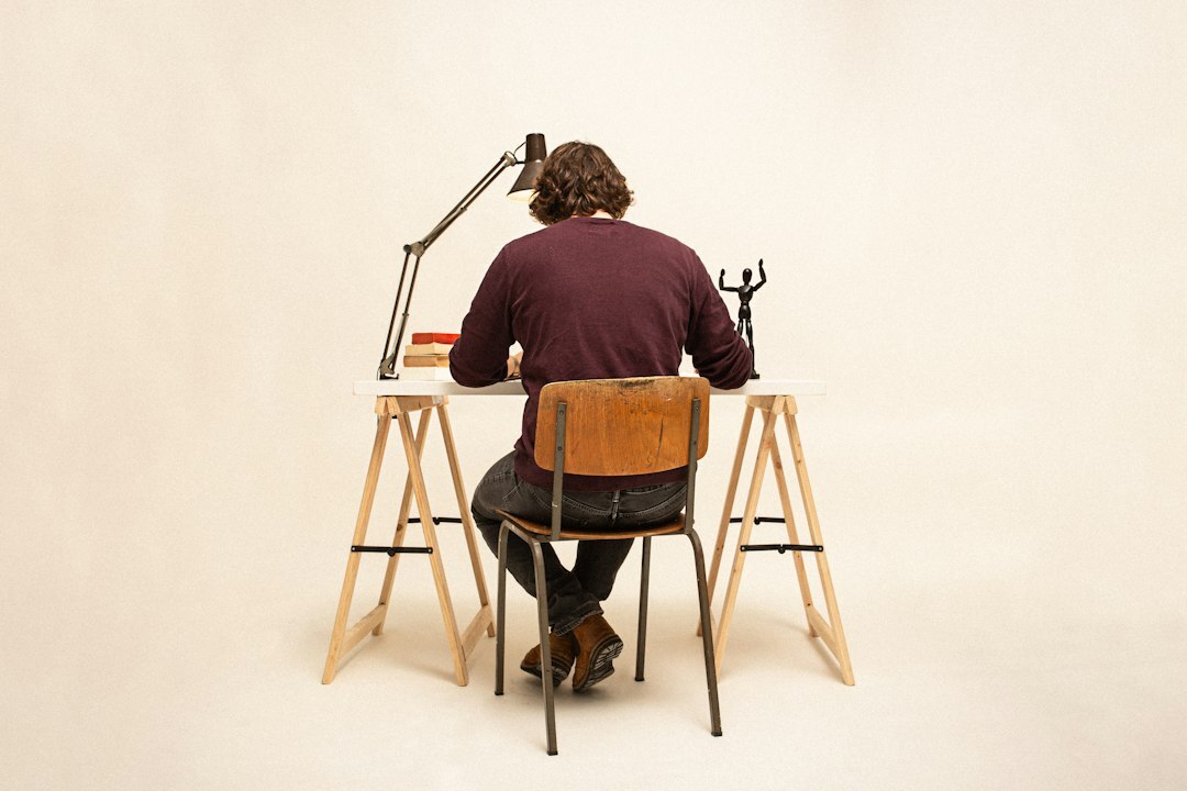 author writing at desk